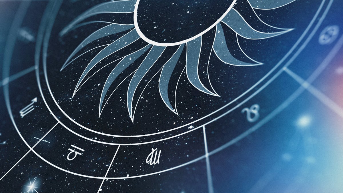 A glowing zodiac wheel with constellations and planets over a deep midnight sky